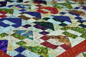 A close-up of a patchwork quilt.